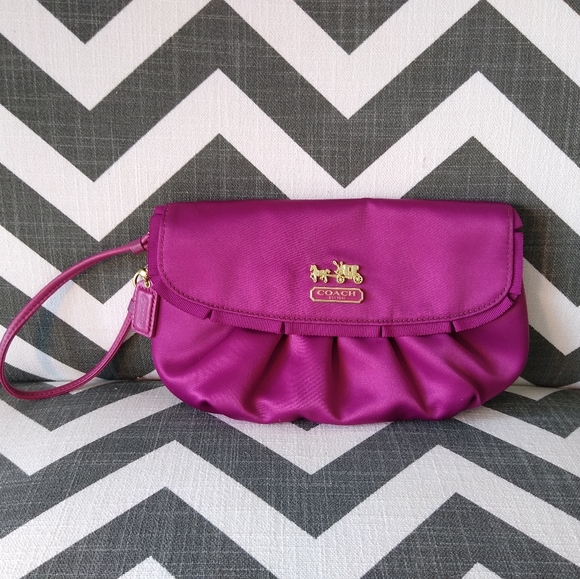 Coach Handbags - Coach fuschia satin wristlet, like new